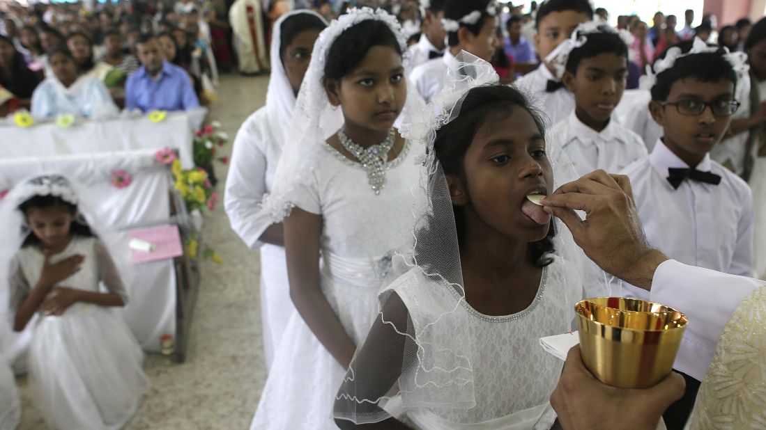 Indian Christians participate in Easter Sunday rituals at a church in Guwahati, India.
