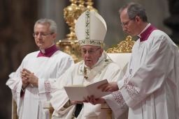 Pope Francis, center, leads the Easter Vigil at St. Peter's Basilica on April 15.