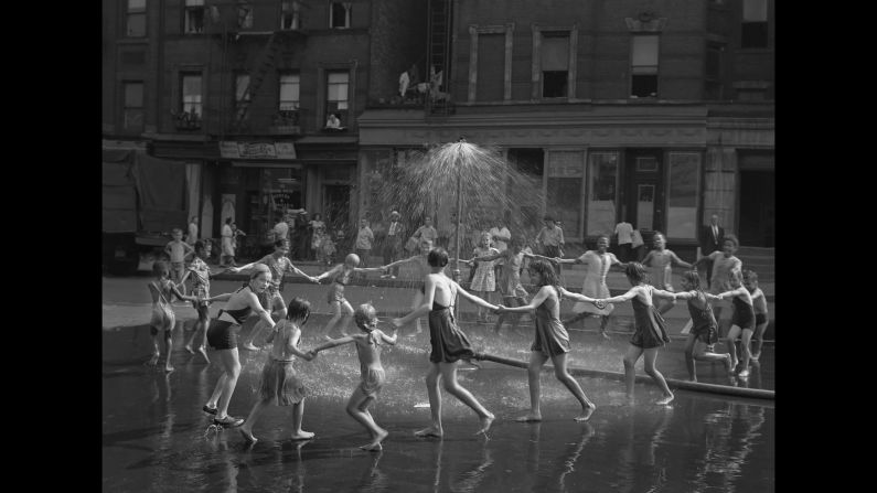 Children play in the water on La Salle Street and Amsterdam Avenue in 1946. Webb moved to New York after spending time as a US Navy photographer in the South Pacific during World War II. The Detroit native bought his first camera in 1938 and developed a greater interest in photography two years later, after completing a 10-day workshop with the legendary Ansel Adams.