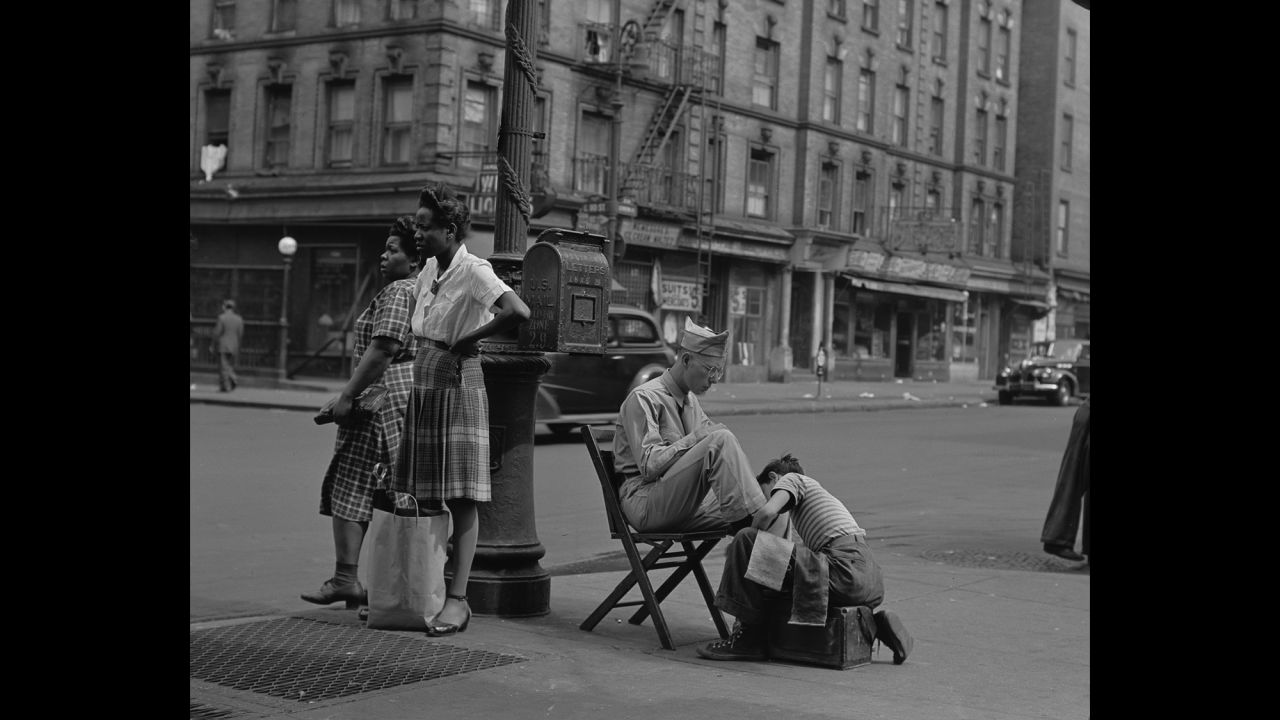 A man on 125th Street gets his shoes shined in this 1946 image. While in New York, Webb became friends with other artists, including Berenice Abbott, Walker Evans, Georgia O'Keeffe, Gordon Parks and Alfred Stieglitz.