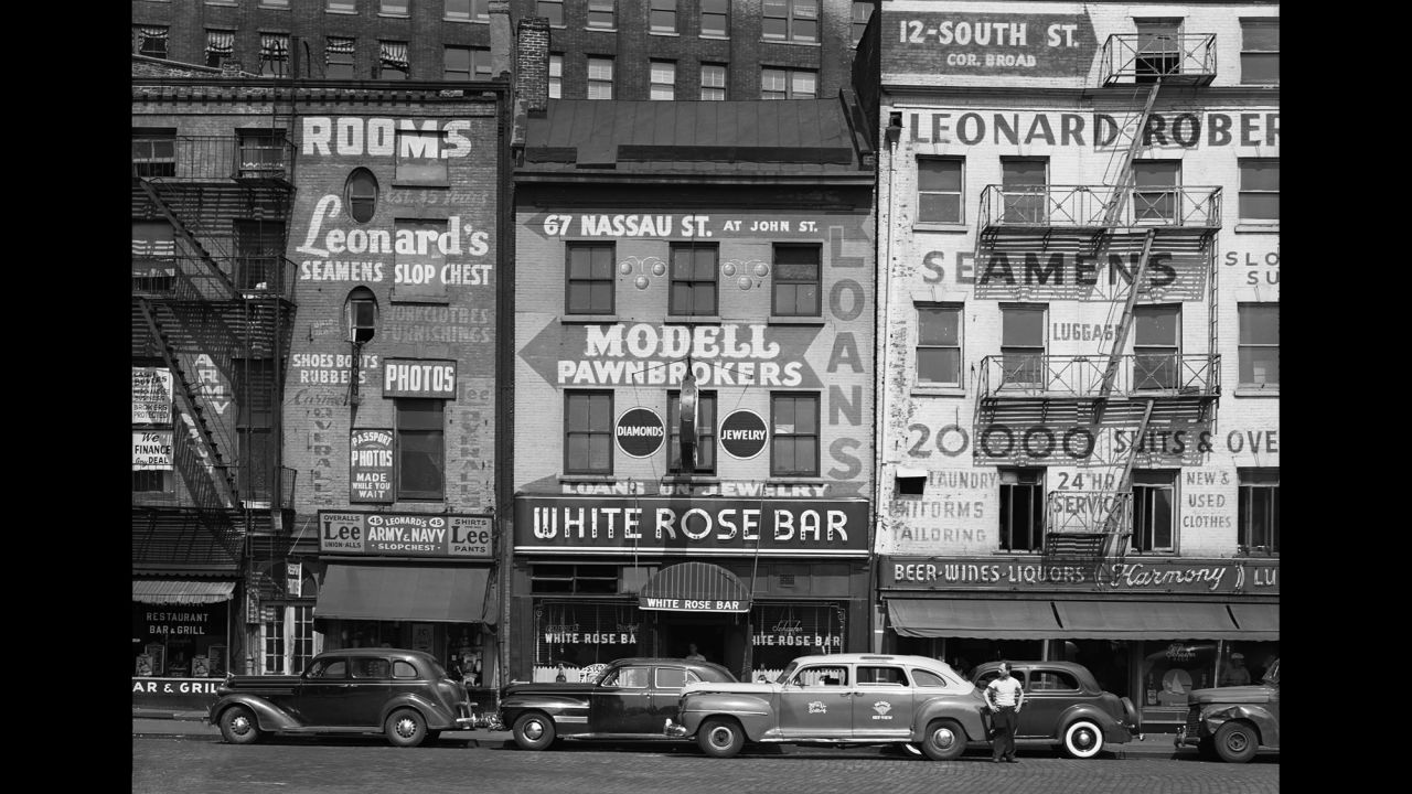 The White Rose Bar on Sixth Avenue, photographed in 1948. "From quirky storefronts and horse-drawn carts to characters on the Bowery, Webb brings us a New York that doesn't exist today," reads a press release by The Curator Gallery.
