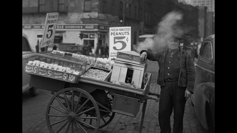 A peanut vendor at the Battery in 1946. Webb spent several decades photographing all parts of the city, "from Midtown's skyscrapers to the Lower East Side's tenements, from high-powered businessmen in the Financial District to the remnants of old ethnic enclaves in Lower Manhattan," writes the Museum of the City of New York.