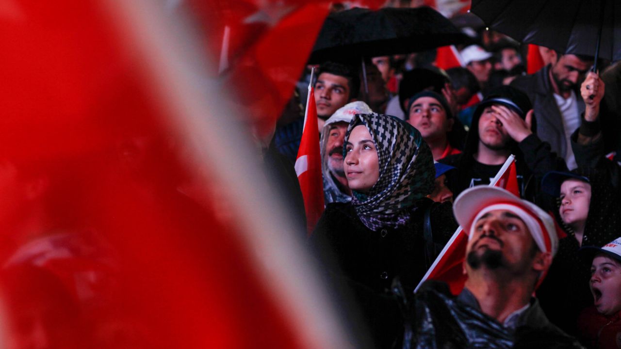Pro-Erdogan supporters attend a rally at ruling AKP headquarters in Ankara shortly after the preliminary results of the Turkish referendum were announced. 