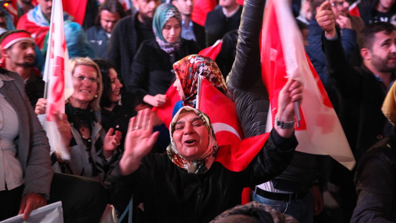 Erdogan supporters dance to the "Yes" campaign song at a pro-Erdogan rally in Ankara on Sunday night.