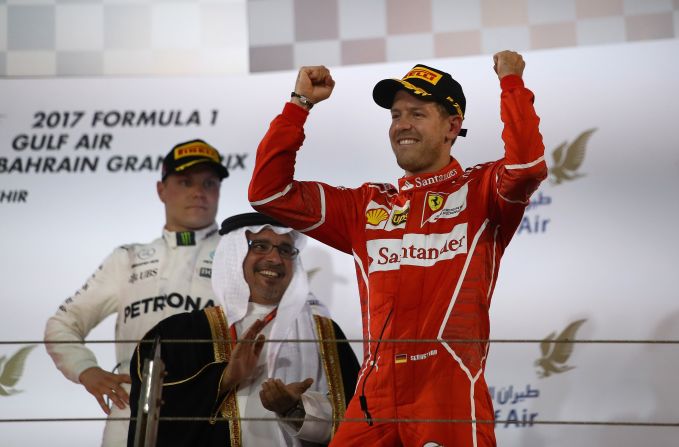 Sebastian Vettel salutes the crowd in Bahrain after clinching his second win of the 2017 F1 season. 