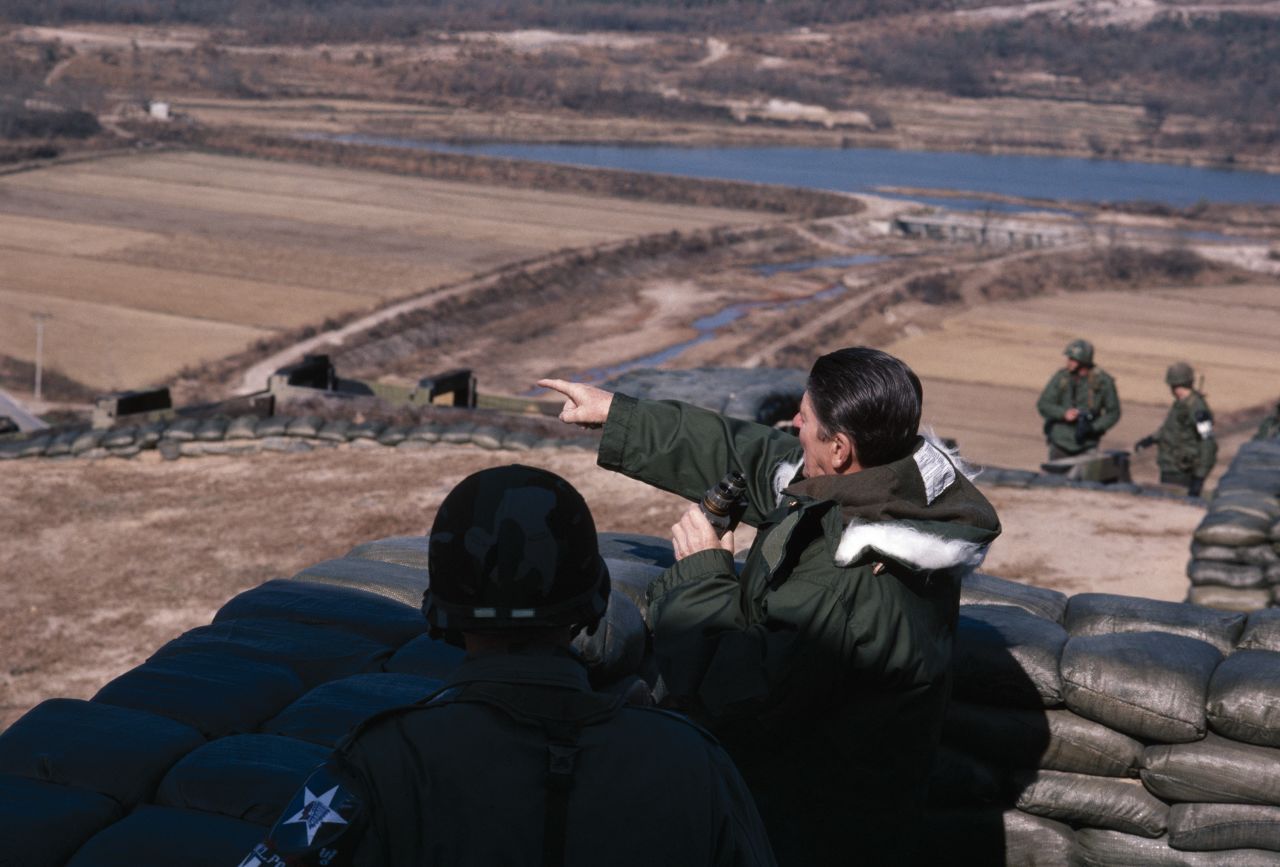 US President Ronald Reagan looks across the DMZ at Guard Post Collier, South Korea, on November 13, 1982.