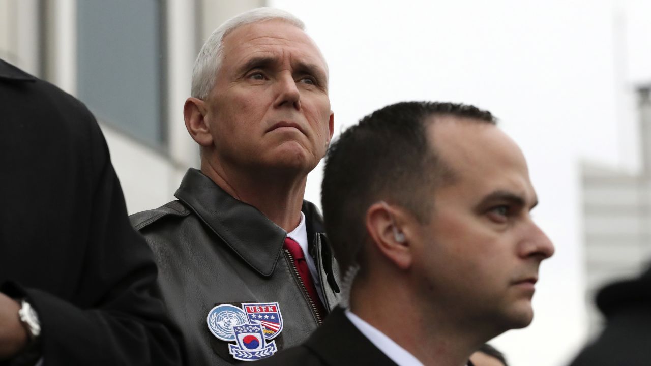 US Vice President Mike Pence looks at North Korea from the border village of Panmunjom on April 17, 2017. Pence visited a military base near the Demilitarized Zone, a day after the North conducted a failed missile launch. Pence arrived at Camp Bonifas on Monday for a briefing with military leaders and to meet with American troops. He is in South Korea as part of a 10-day tour of Asia.