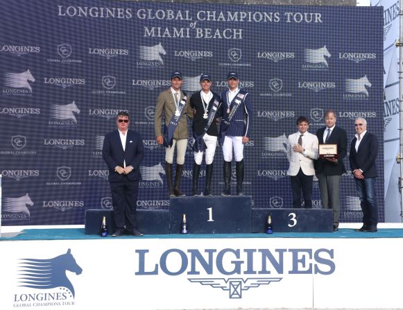 The three top riders (from left to right: Zorzi, Guery and Philippaerts) pose for a shot on the podium following the award ceremony. 