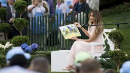 First lady Melania Trump reads to children during the event.