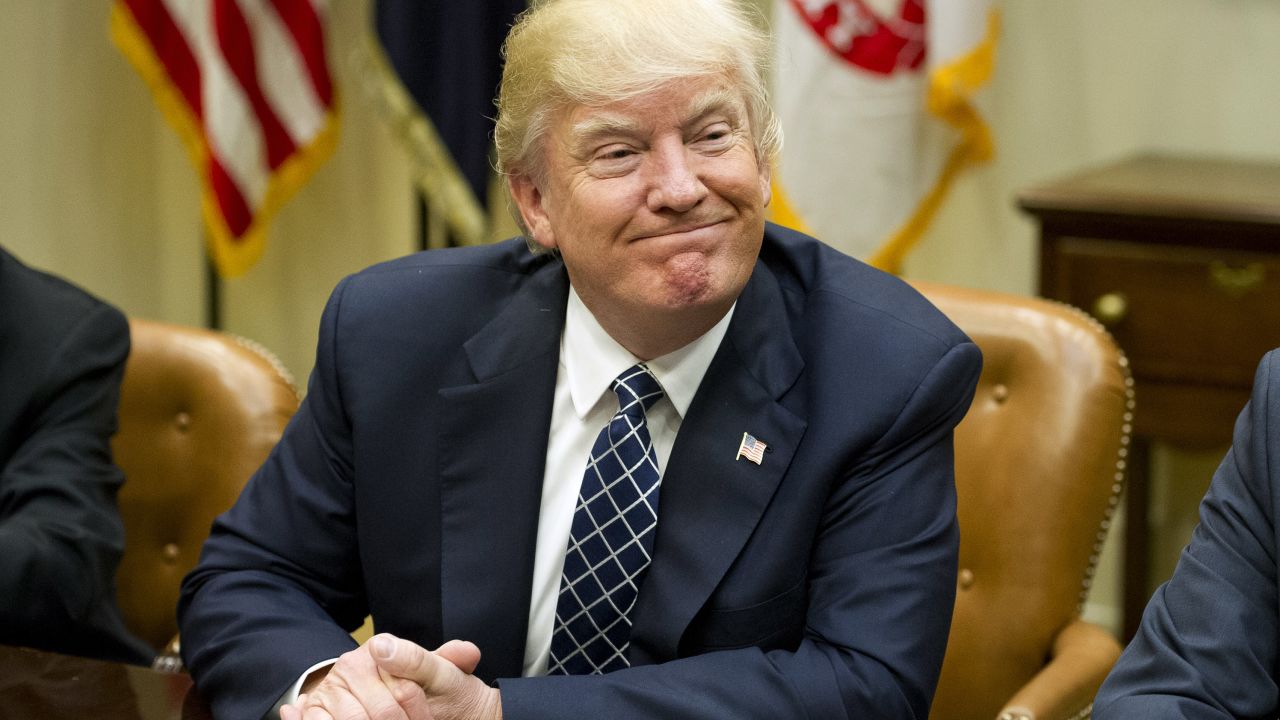 US President Donald Trump makes remarks as he hosts a listening session with the Fraternal Order of Police in the Roosevelt Room of the  White House on March 28, 2017  in Washington, DC. 