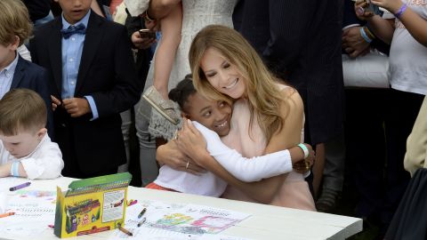 The first lady hugs a child at the annual <a href="http://www.cnn.com/2017/04/17/politics/white-house-easter-egg-roll/" target="_blank">White House Easter Egg Roll</a> in April 2017. They were making cards for members of the US military.