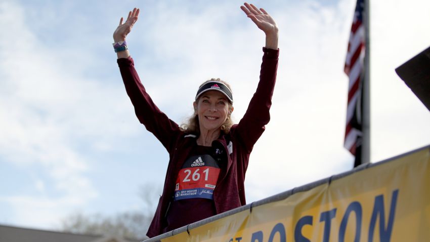 Kathrine Switzer, who was the first official woman entrant in the Boston Marathon 50 years ago, acknowledges the crowd as she is introduced before firing the gun to start the women's elite division at the start of the 2017 Boston Marathon.