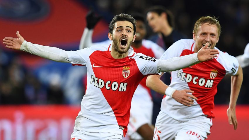 Monaco's Portuguese midfielder Bernardo Silva (C) celebrates after scoring a goal during the French L1 football match between Paris Saint-Germain and Monaco at the Parc des Princes stadium in Paris on January 29, 2017.  / AFP / FRANCK FIFE        (Photo credit should read FRANCK FIFE/AFP/Getty Images)