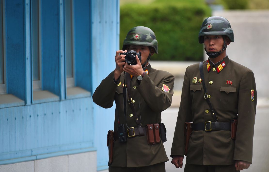 A North Korean soldier takes a photo during US Vice President Mike Pence's visit to the Demilitarized Zone (DMZ), April 17.