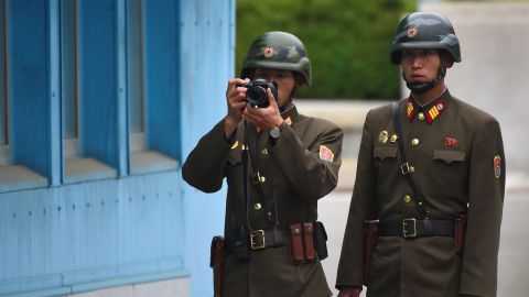 A North Korean soldier takes a photo during US Vice President Mike Pence's visit to the Demilitarized Zone (DMZ), April 17.