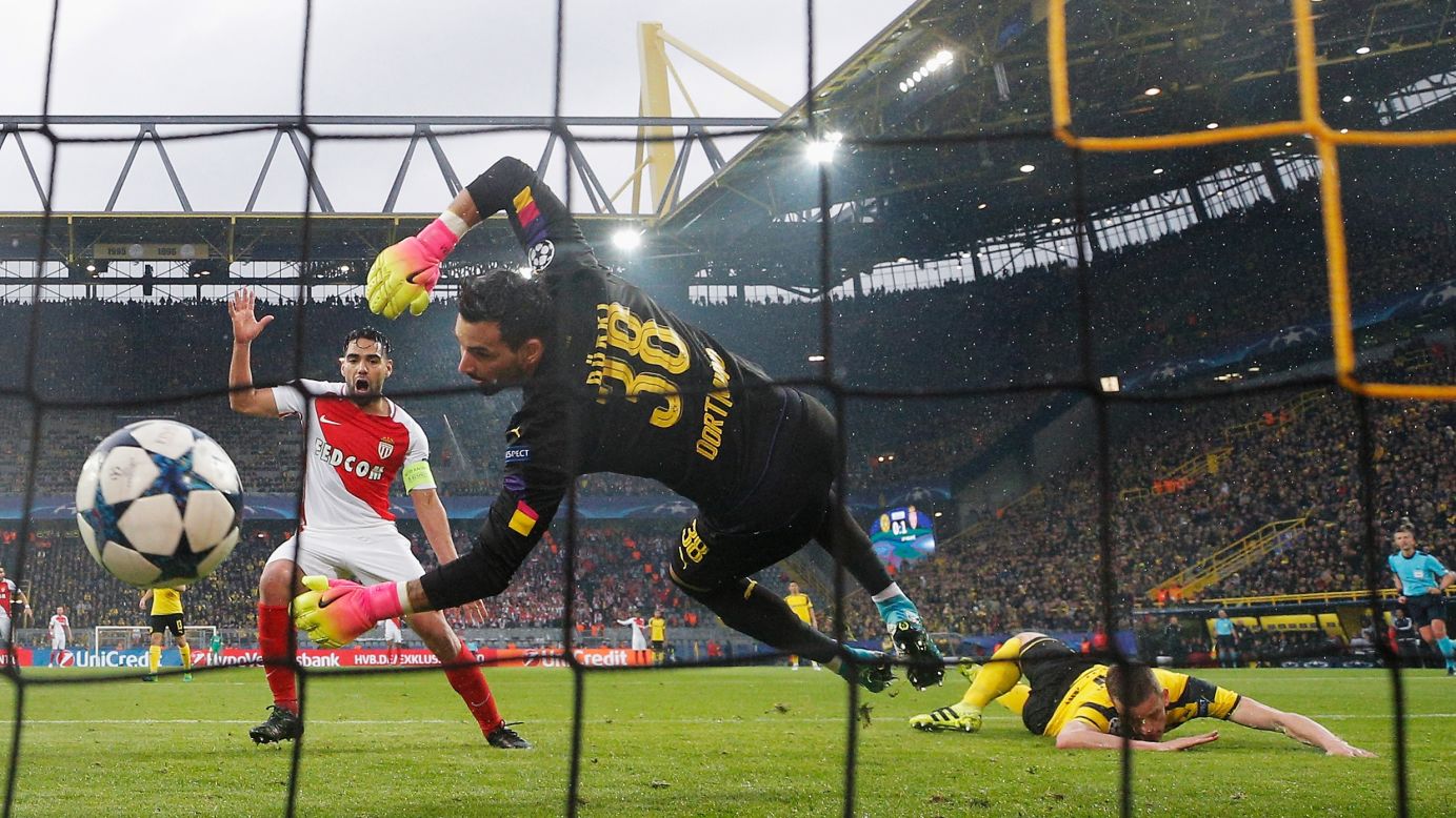 Sven Bender of Borussia Dortmund, right, scores an own goal during a UEFA Champions League quarterfinal match against Monaco in Dortmund, Germany, on Wednesday, April 12. Monaco won 3-2. The original game was postponed after a <a href="http://www.cnn.com/2017/04/12/europe/dortmund-explosion-germany/" target="_blank">bomb attack on the Borussia Dortmund team bus</a> on Tuesday.