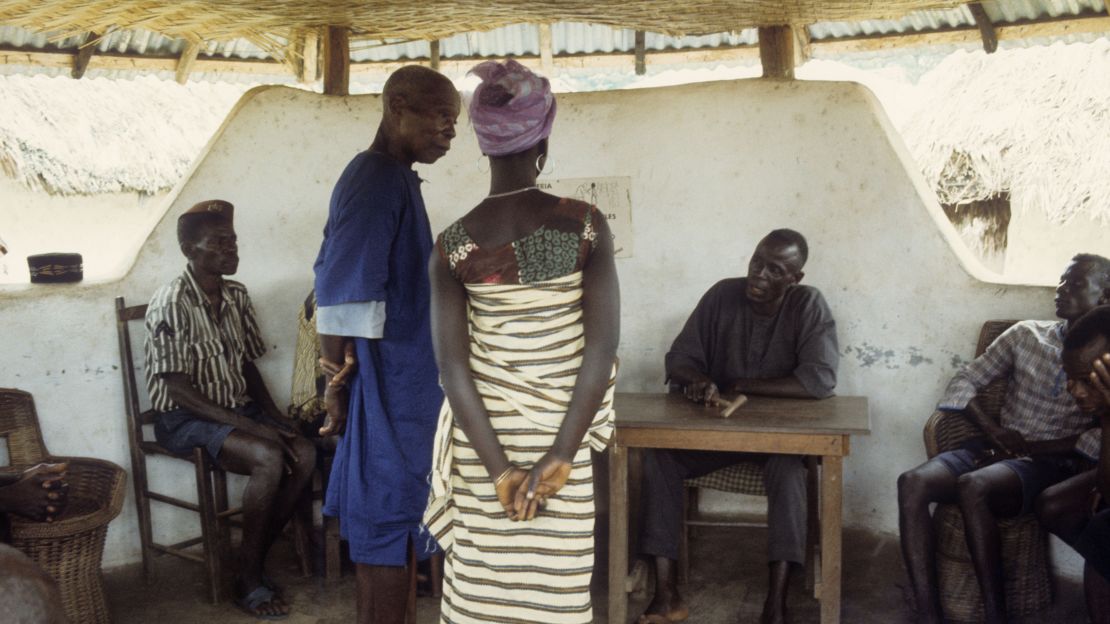 Traditional trial by village chief as judge in tribal village court, Kpelle tribe, Liberia, Africa. 