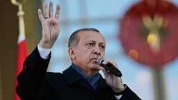 Turkey's President Recep Tayyip Erdogan, delivers a speech during a rally of supporters a day after the referendum, outside the Presidential Palace, in Ankara, Turkey, Monday, April 17, 2017. Turkey's main opposition party urged the country's electoral board Monday to cancel the results of a landmark referendum that granted sweeping new powers to Erdogan, citing what it called substantial voting irregularities. (AP Photo/Burhan Ozbilici)