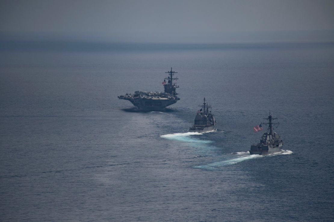 The aircraft carrier USS Carl Vinson leads the guided-missile destroyer USS Michael Murphy and the guided-missile cruiser USS Lake Champlain in the Indian Ocean on April 14.