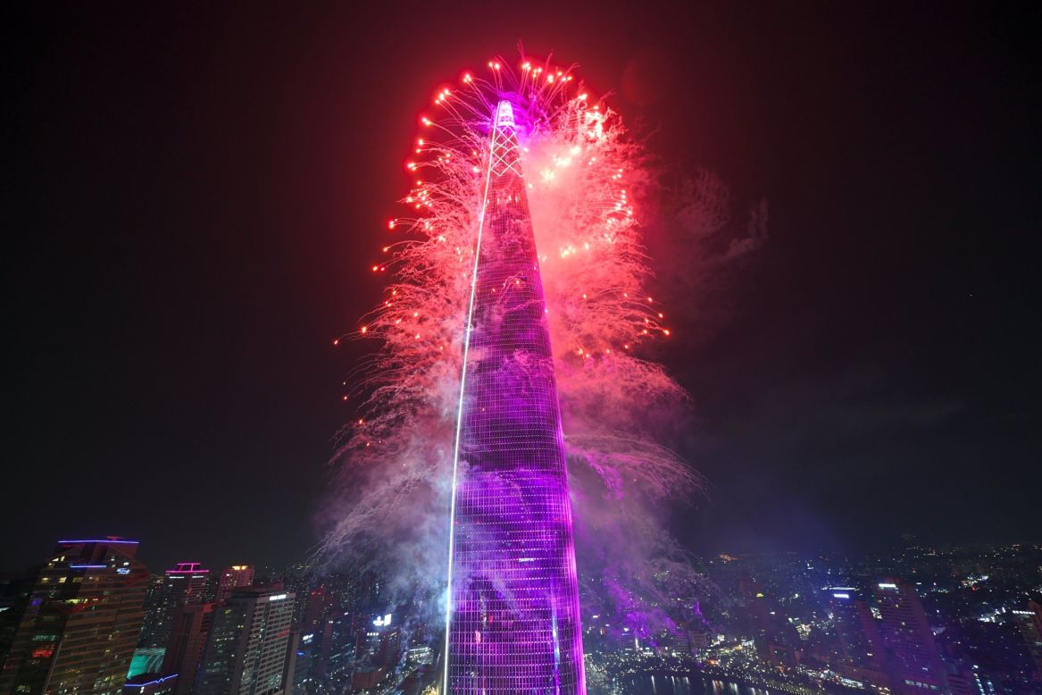 Fireworks celebrate the opening of Lotte World Tower in Seoul on April 2, 2017. 