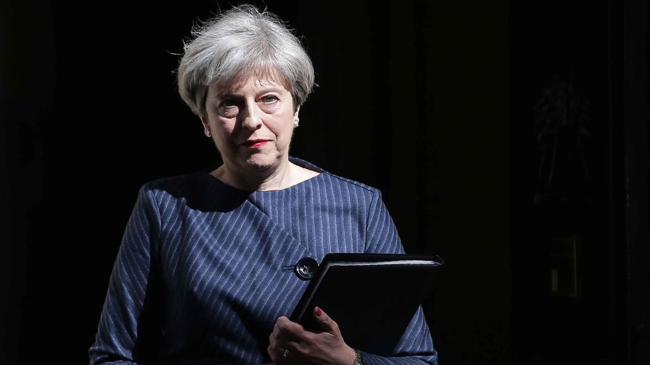 British Prime Minister Theresa May walks out of 10 Downing Street to make a statement to the media in central London on April 18, 2017.
British Prime Minister Theresa May called today for an early general election on June 8 in a surprise announcement as Britain prepares for delicate negotiations on leaving the European Union. / AFP PHOTO / Daniel LEAL-OLIVAS (Photo credit should read DANIEL LEAL-OLIVAS/AFP/Getty Images)