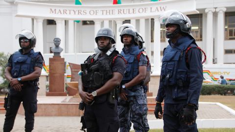 Policemen stand guard in front of Ghana's Supreme Court in Accra.