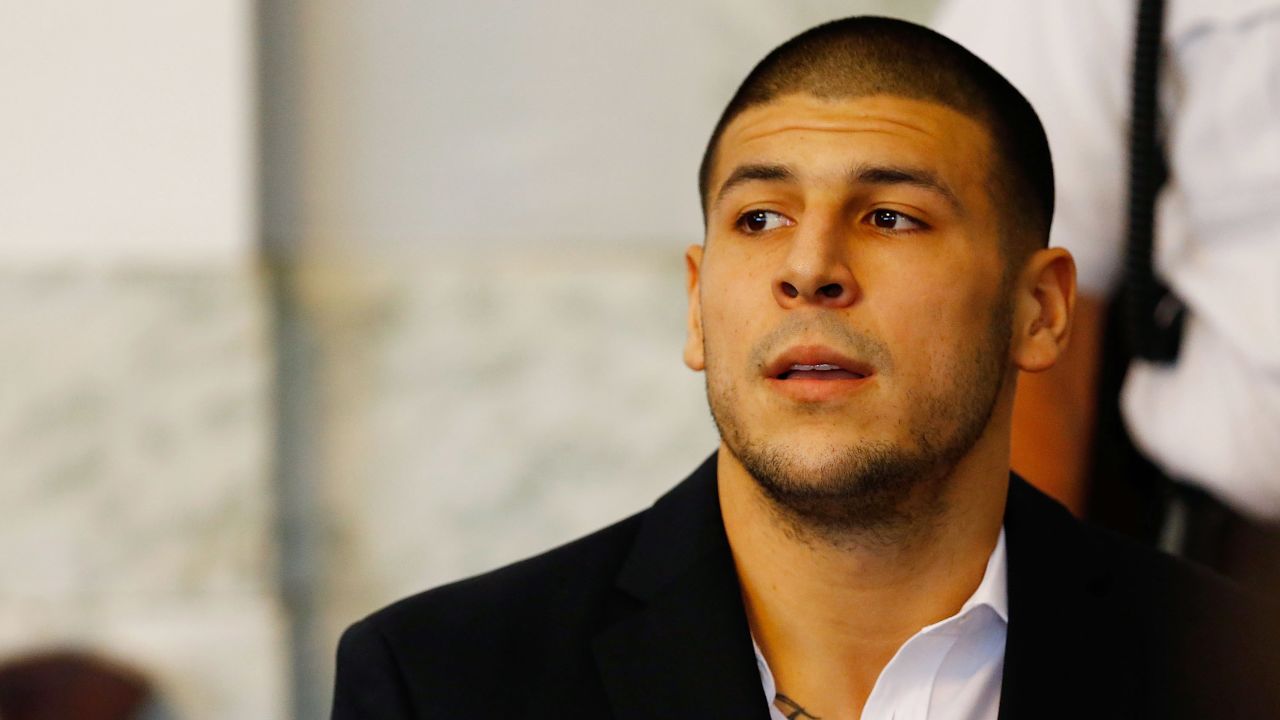 NORTH ATTLEBORO, MA - AUGUST 22: Aaron Hernandez sits in the courtroom of the Attleboro District Court during his hearing on August 22, 2013 in North Attleboro, Massachusetts. Former New England Patriot Aaron Hernandez has been indicted on a first-degree murder charge for the death of Odin Lloyd. (Photo by Jared Wickerham/Getty Images)