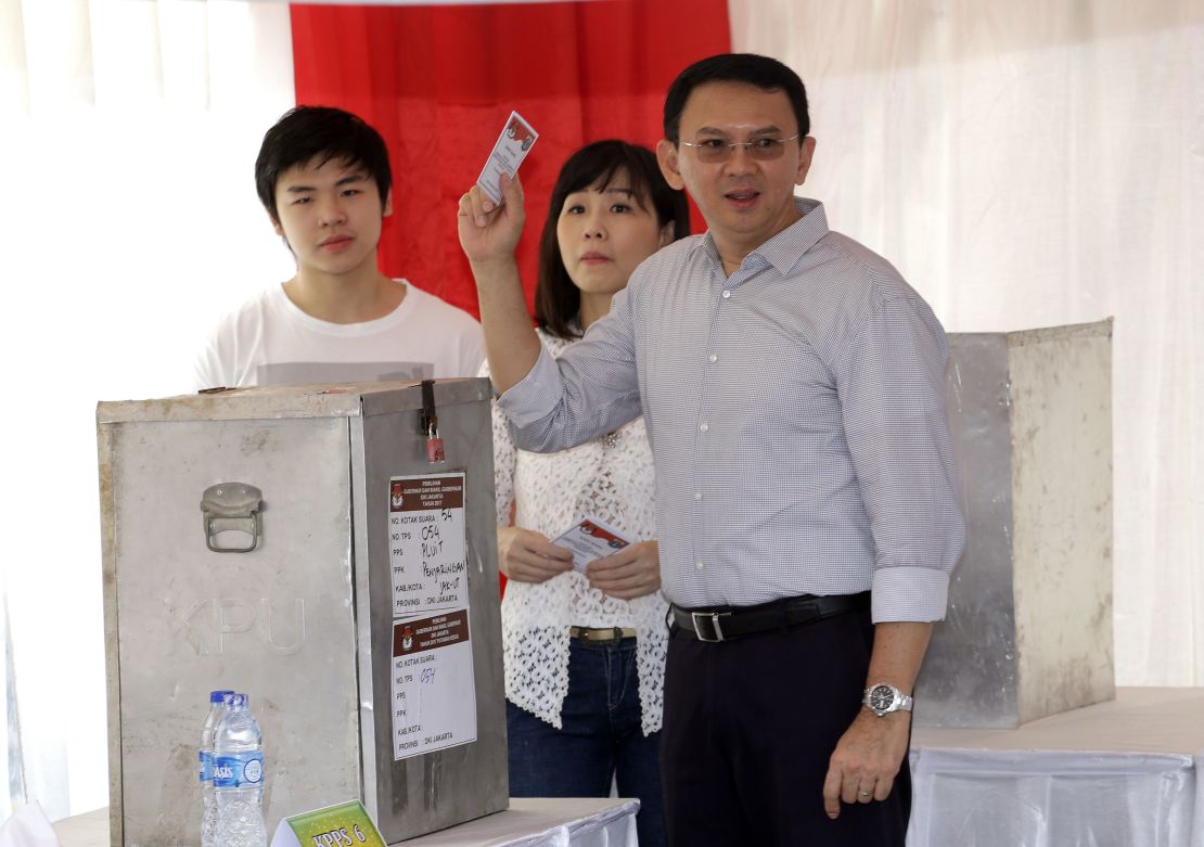 Jakarta Gov. Basuki "Ahok" Tjahaja Purnama and his family cast their ballots Wednesday in Jakarta.