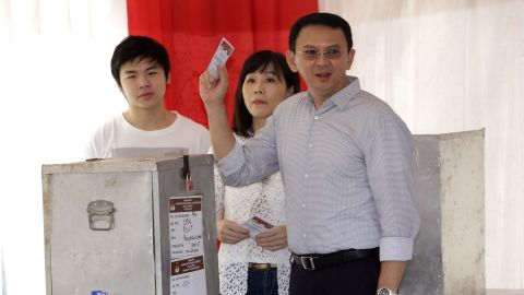 Incumbent governor Ahok casts his vote in the Jakartan gubernatorial elections.