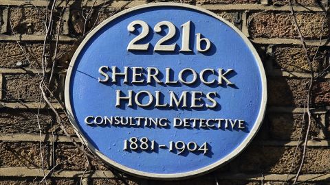 A plaque outside the former home of the fictional character Sherlock Holmes on Baker Street in London.