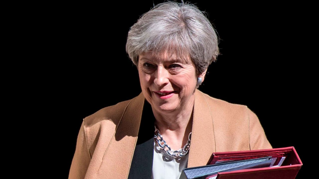 British Prime Minister Theresa May leaves 10 Downing Street in central London on April 19, 2017 ahead of the weekly Prime Minister's Questions session in the House of Commons.
British Prime Minister Theresa May called on April 18 for a snap election on June 8, in a shock move as she seeks to bolster her position before tough talks on leaving the EU. MPs are set to vote on the motion following Prime Minister's Questions in the House of Commons. / AFP PHOTO / CHRIS J RATCLIFFE (Photo credit should read CHRIS J RATCLIFFE/AFP/Getty Images)