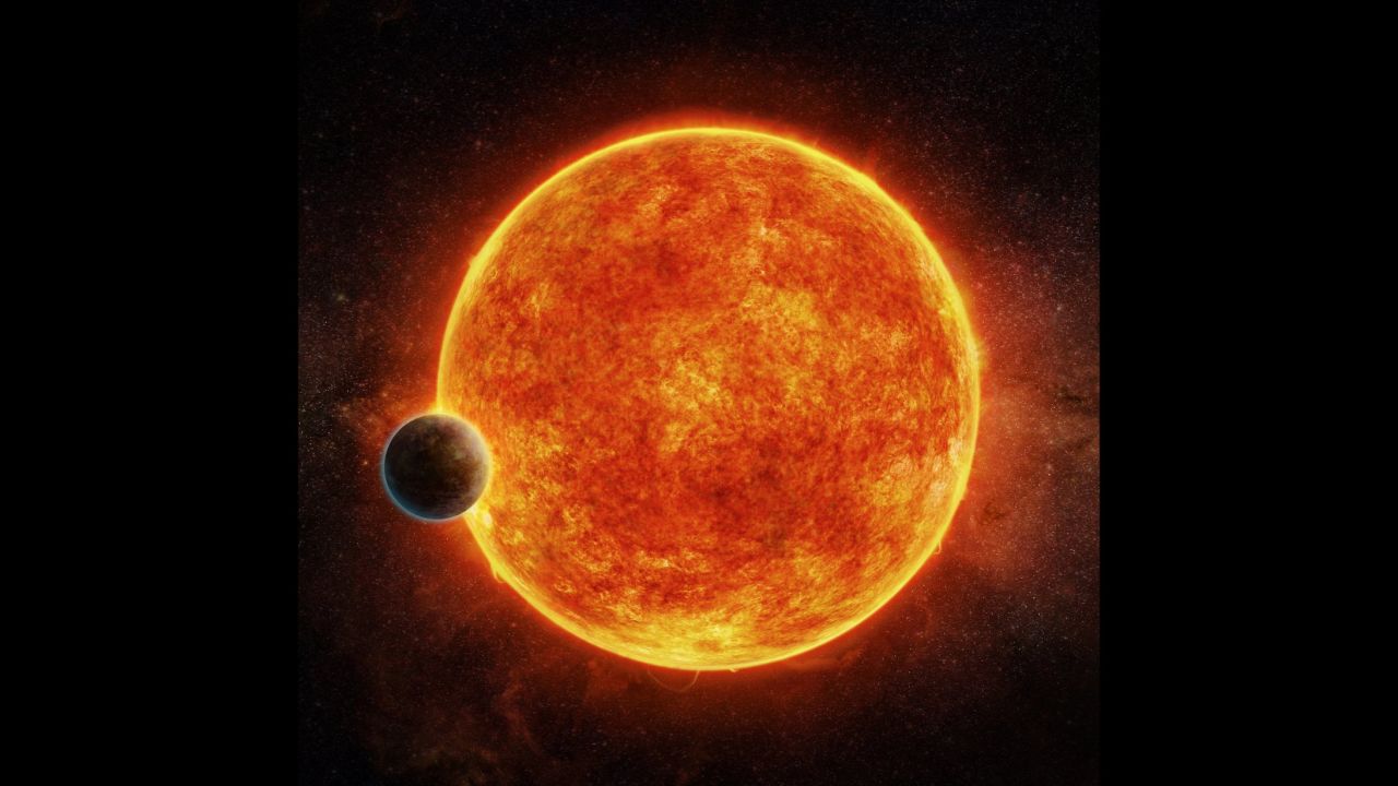 LHS 1140b is located in the liquid water habitable zone surrounding its host star, a small, faint red star named LHS 1140. The planet weighs about 6.6 times the mass of Earth and is shown passing in front of LHS 1140. Depicted in blue is the atmosphere the planet may have retained.