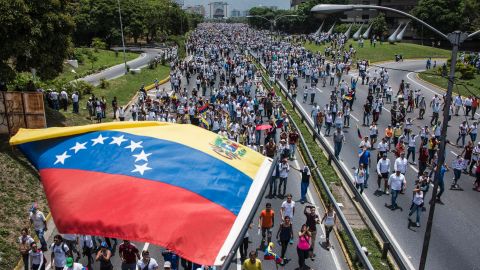 Thousands rally Wednesday against Venezuelan President Nicolas Maduro in eastern Caracas.
