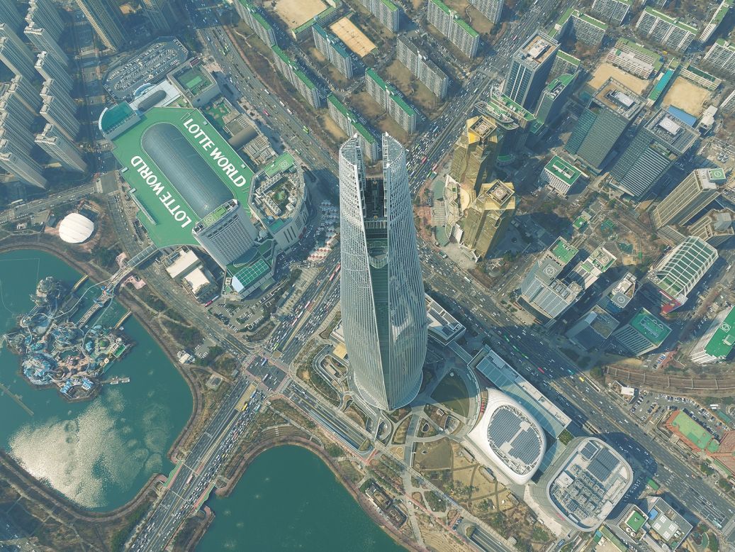 An aerial view of the tower shows its stark vertical contrast, compared with its neighbors.