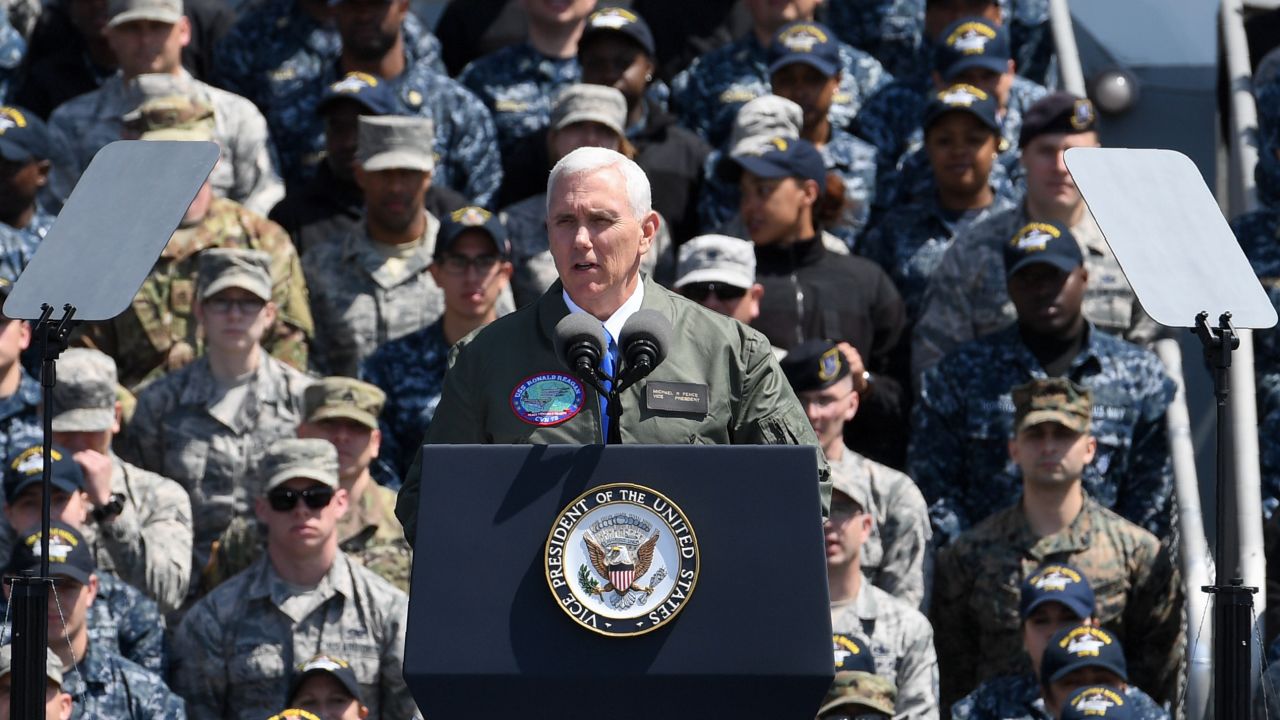 US Vice President Mike Pence delivers a speech before US and Japanese soldiers onboard USS Ronald Reagan at the US Naval base in Yokosuka on April 19, 2017. / AFP PHOTO / Toshifumi KITAMURA        (Photo credit should read TOSHIFUMI KITAMURA/AFP/Getty Images)