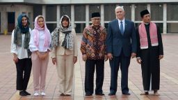US Vice President Mike Pence (2nd R), his wife Karen (3rd L) and their daughters Charlotte (2nd L) and Audrey (L), Muhammad Muzammil Basyuni (3rd R) and Nasarudin Umar (R) from the Istiqlal mosque pose for a photo at the Istiqlal grand mosque in Jakarta on April 20, 2017. 
US Vice President Mike Pence on April 20 praised Indonesia's moderate form of Islam as "an inspiration" at the start of a visit to the Muslim-majority country seen as a bid by his administration to heal divisions with the Islamic world. / AFP PHOTO / POOL / Adek BERRY        (Photo credit should read ADEK BERRY/AFP/Getty Images)