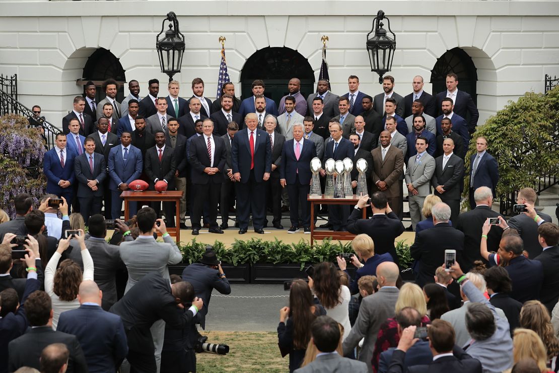 U.S. President Donald Trump poses for photographs with the New England Patriots during a celebration of the team's Super Bowl victory on the South Lawn at the White House April 19, 2017.