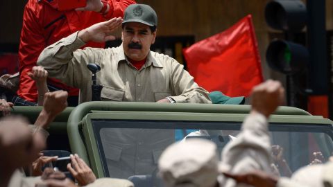 Venezuelan President Nicolas Maduro salutes Monday during Bolivarian militia celebrations in Caracas.