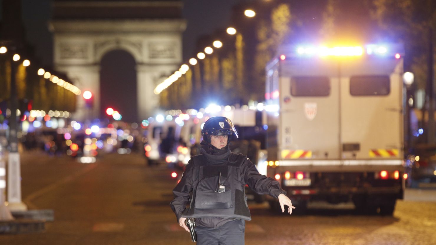 A police officer stands guard after a fatal shooting  on the Champs-Elysees in Paris.