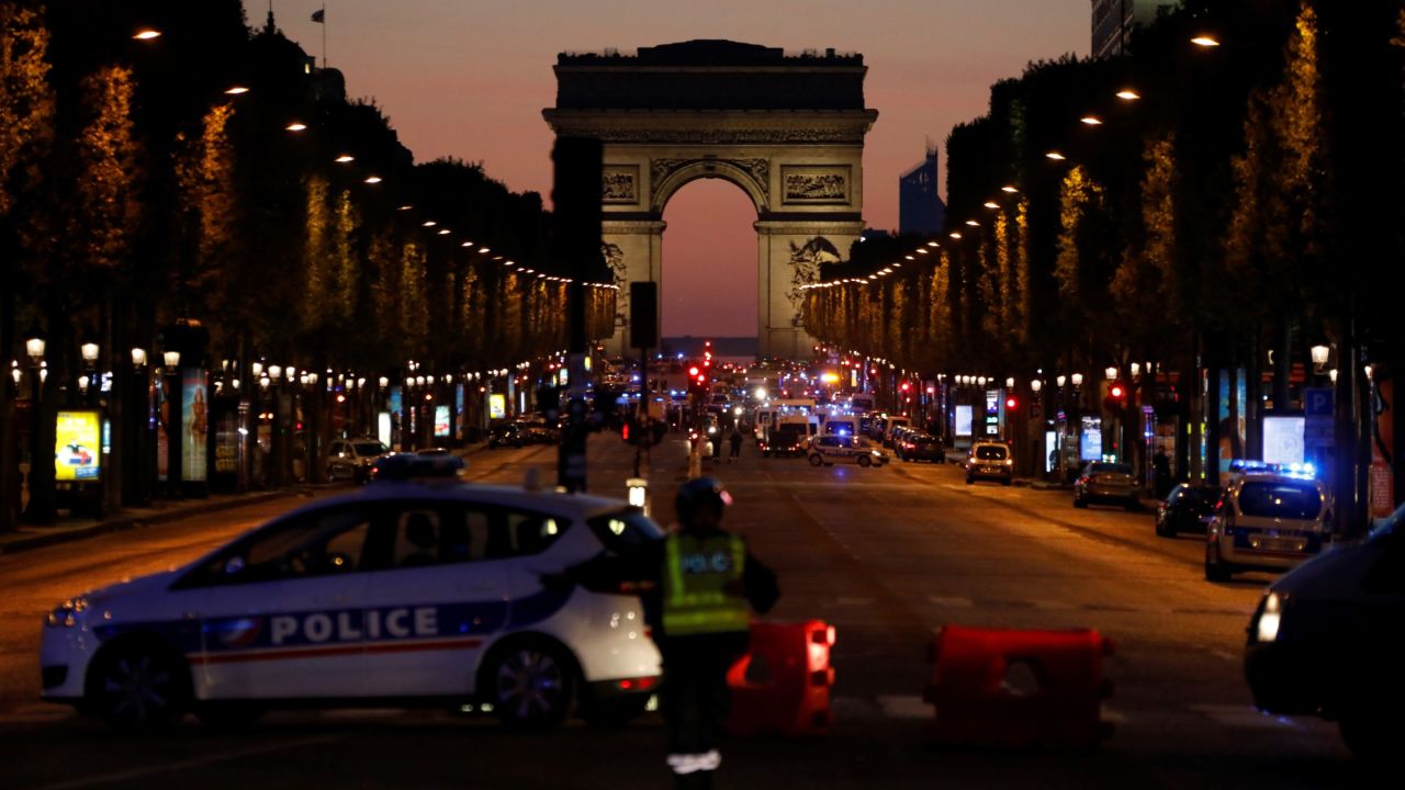 Police officers block access to the Champs-Elysees in Paris <a href="http://www.cnn.com/2017/04/20/europe/champs-elyses-in-paris-closed/index.html" target="_blank">after a shooting</a> on Thursday, April 20. One police officer and the attacker were killed. The suspect was known to French security services for radical Islamist activities, a source close to the investigation told CNN.