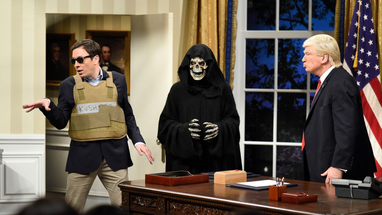 A "Saturday Night Live" sketch features Jimmy Fallon as Jared Kushner, left, Grim Reaper as Steve Bannon and Alec Baldwin as US President Donald Trump on Saturday, April 15.