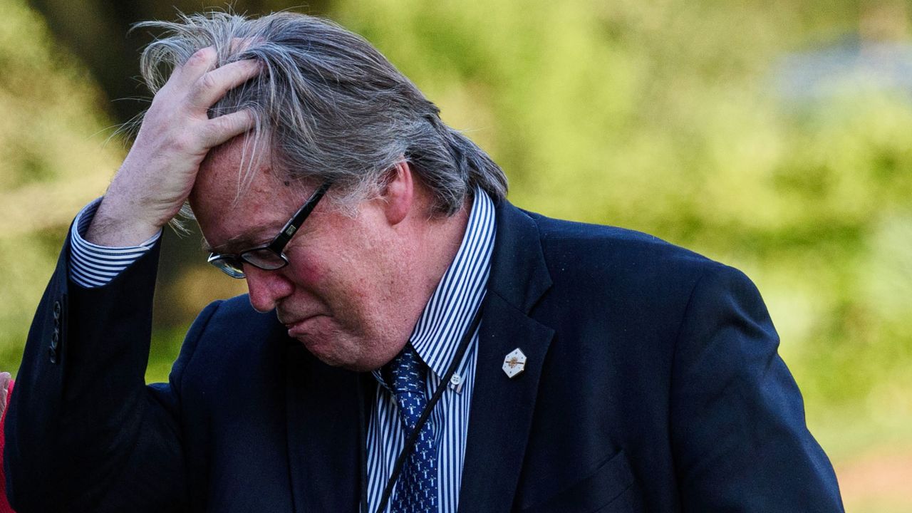 Steve Bannon, White House chief strategist, walks across the South Lawn upon returning to the White House with US President Donald Trump on Tuesday, April 18.