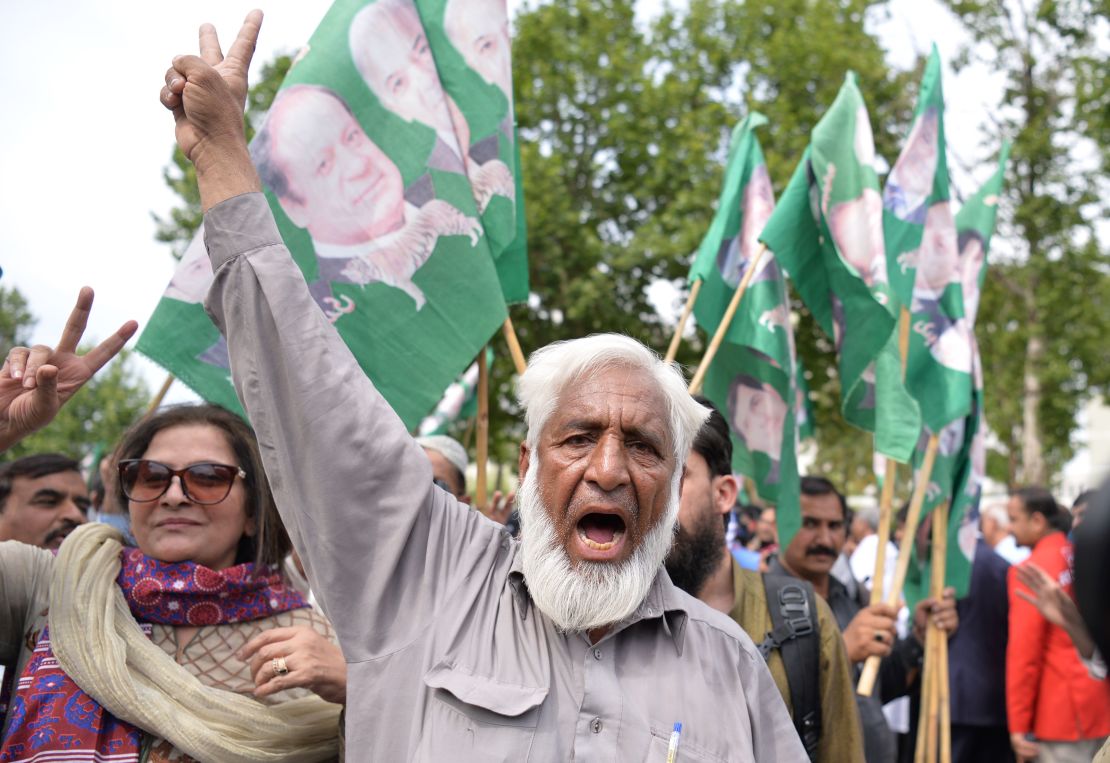 Supporters of Nawaz celebrate after Thursday's Supreme Court verdict in Islamabad, Pakistan.