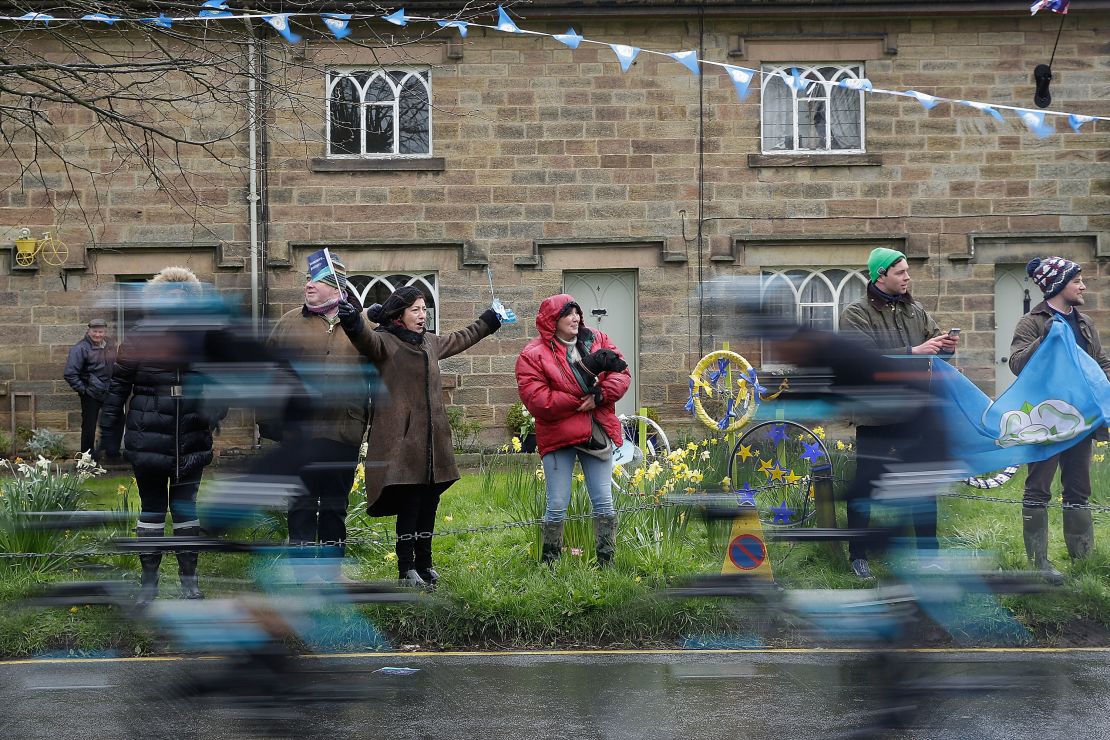 Spectators line the main street of Ripley as the riders of the Tour De Yorkshire cycle race pass through the village.