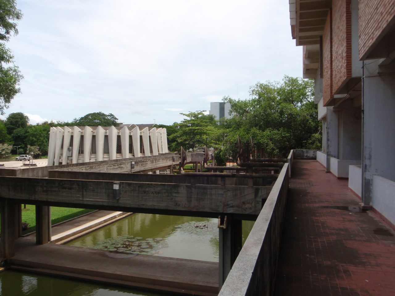 The Institute of Foreign Languages features elevated walkways and baray, a rectangular body of water that featured commonly in ancient structures from the Khmer Empire era (802-1431).