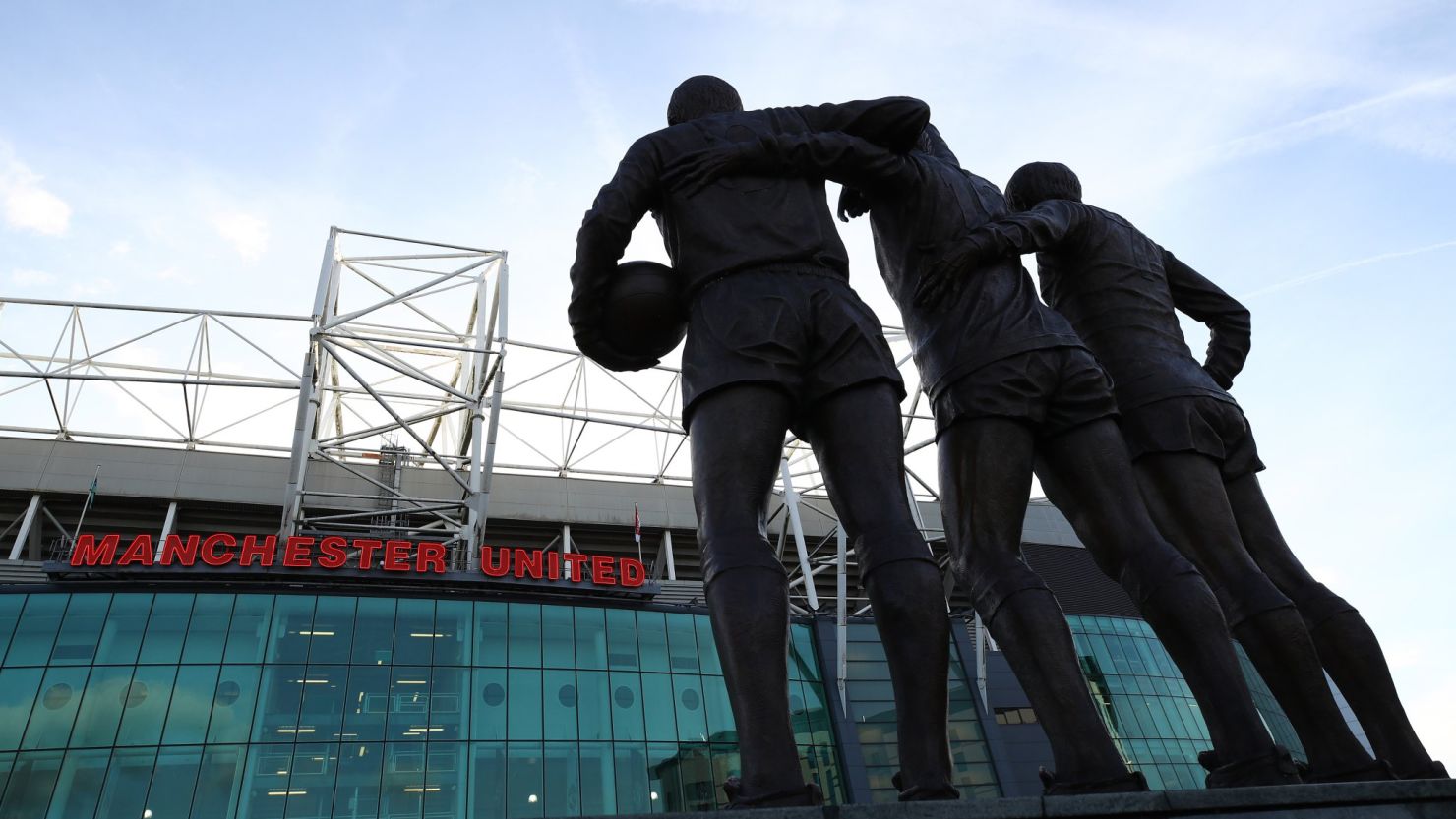 Manchester United tweeted its condolences accompanied by a photo of the iconic "Holy Trinity" statue in front of Old Trafford. 