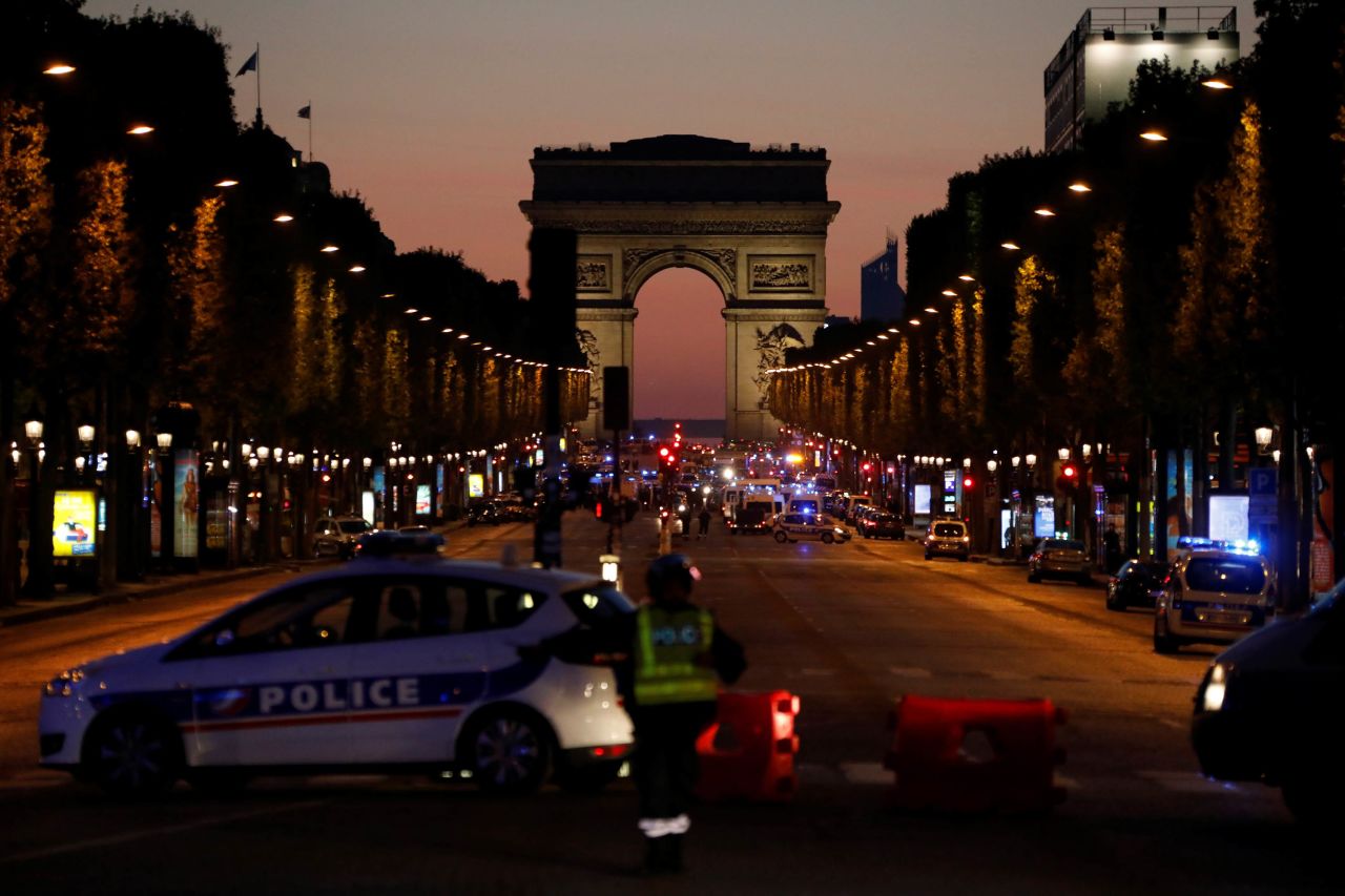 Police officers block access to the Champs-Elysées in Paris <a href="http://www.cnn.com/2017/04/20/europe/champs-elyses-in-paris-closed/index.html">after a shooting</a> on Thursday, April 20. One police officer and an attacker were killed, according to CNN affiliate BFMTV and the French Interior Ministry.