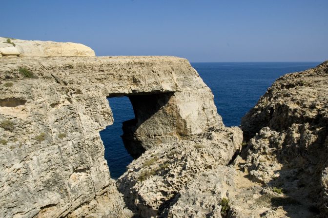<strong>Wied il-Mielah: </strong>The lesser-known natural limestone arch of Wied il-Mielah sits on the northwest coast of Gozo in Gharb.  