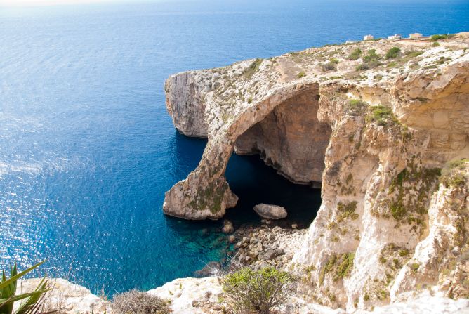 <strong>The Blue Grotto:</strong> A limestone arch in southern Malta, the Blue Grotto is made from six caves weathered over time.