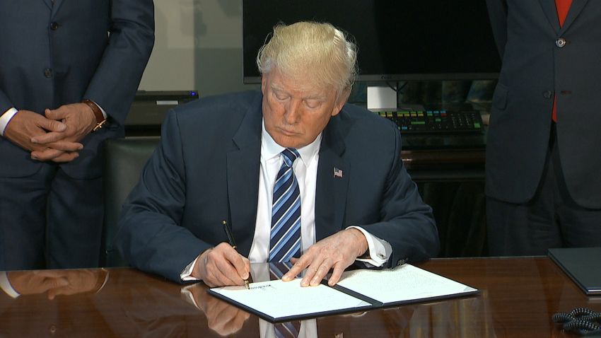 President Donald Trump signs financial reform executive orders 0421